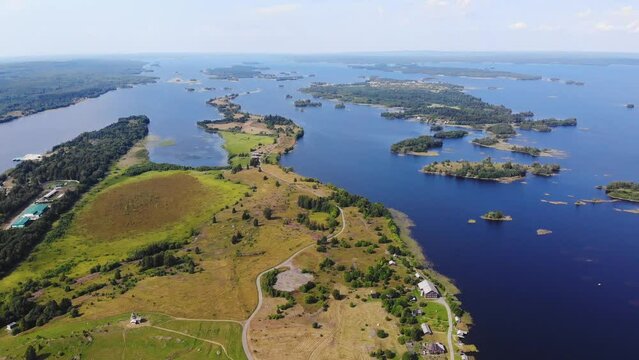 Kizhi Island and Kizhi Pogost wooden church open-air museum, aerial summer vibrant view of Onega Lake, Medvezhyegorsky District, Republic of Karelia, Russia
