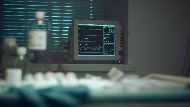 Hospital heart rate monitor showing pulse pressure data in modern clinic ward.