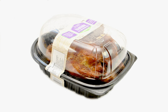 Store Cooked Hot Roasted Whole Chicken In A Plastic Container