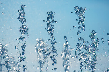 drops water of the fountain in the sky