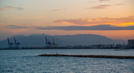 Sunset at the harbor of Malaga, Spain
