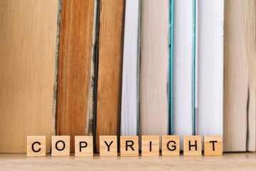 On the bookshelf, the word copyright opposite books.