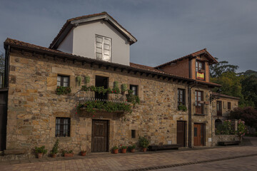 Fototapeta na wymiar Streets and facades in Liérganes, a town in Cantabria (Spain) located in the region of Trasmiera.