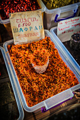 Saffron for sale on the market in Yerevan, Armenia. Dry saffron stamens on the market, close up, Tashir market, Armenia