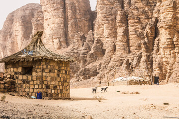 Tuareg tribe settlement in Sahara desert, Hoggar mountains, Djanet, Algeria - obrazy, fototapety, plakaty
