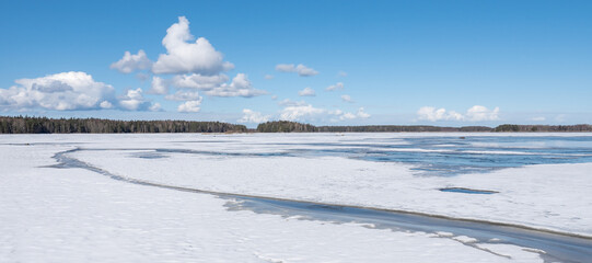 Fototapeta na wymiar Lake in early spring. Farnebofjarden national park in north of Sweden.
