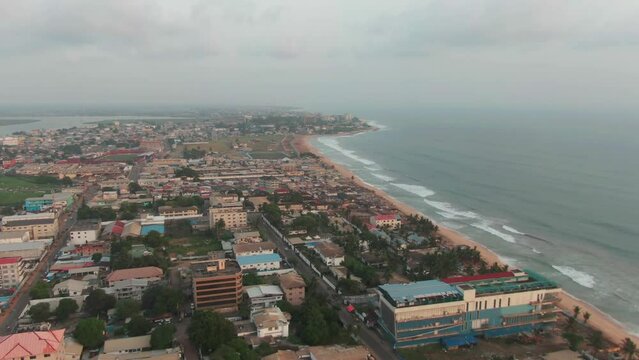 Aerial drone shot of the Skyline of Monrovia, Liberia with the Atlantic Coast of West Africa background