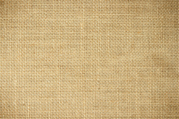 Fototapeta na wymiar Jute hessian sackcloth burlap canvas woven texture background pattern in light beige cream brown color blank. Natural weaving fiber linen and cotton cloth decoration. 