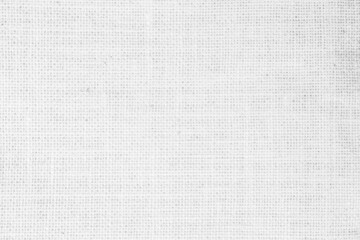 Fototapeta na wymiar White fabric jute hessian sackcloth canvas woven gauze texture pattern. Natural linen, cotton cloth ackground empty for decoration. 