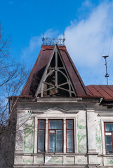 Beautiful building on the roof. The roof of an old wooden house in Arkhangelsk, Russia