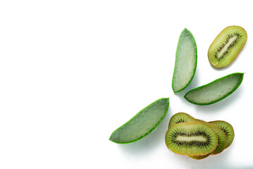 ORGANIC, NATURAL Aloe vera and kiw slice on white background,  with copy space. (Aloe barbadensis Mill, Star cactus, Aloe, Jafferabad or Barbados) a very useful herbal medicine for skin  and hair care