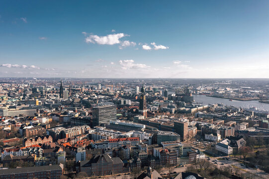 Cityscape of Hamburg, Germany, on the sunny day. Aerial panoramic view on the city center, Hafencity and St Pauli district © uslatar