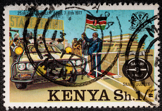 Kenya - circa 1977: A Kenyan postage stamp depicts the winner at the finish line from the Series 25 th Safari rally, April 7-11 th 1977. Circa 1977.