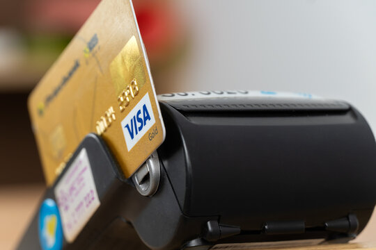 Batumi, Georgia - April 5 2022: Close-up of a payment terminal with a visa plastic card