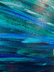 Close up picture trendy hand paint in blue color acrylic texture, as wallpaper. Mixed media painting for creative artistic design of posters, cards, banners, websites. Bright blue and green colours.