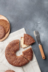 Reikäleipä - traditional finnish rye bread on a gray concrete background