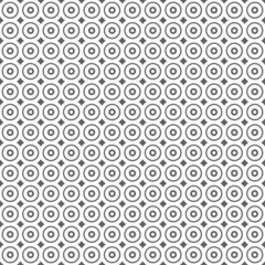 Vector illustration. Geometric seamless pattern. Solid dots and rhombus-shaped linear circles. Spotted gray and white background. Simple black and white abstract pattern.