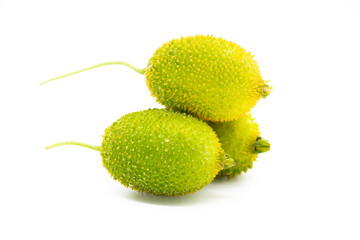 Selective focus, spiny gourd cut on white background
