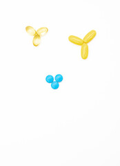 Different pills isolate on white background , selective focus, top view