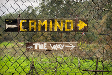 Camino de Santiago Signs: Way of St James Pilgrim Wooden Trail Markers with the Yellow Arrow Sign...