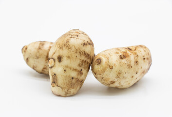 taro root or Arbi on white background, it's have full on calcium and iron