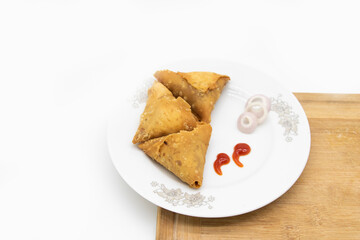 three Samosa isolated on white background,