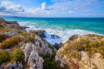 Beautiful landscape with a rocky sea shore on a sunny day