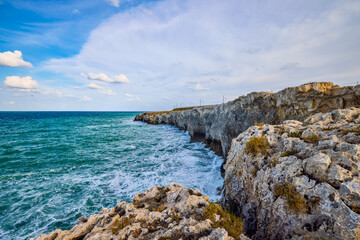 Beautiful landscape with a rocky sea shore on a sunny day