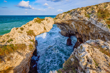 Fototapeta na wymiar Beautiful landscape with a rocky sea shore on a sunny day