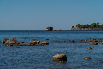 Russia. Kronstadt. May 30, 2021. The Reef Fort and Tolbukhin Lighthouse are on the horizon.