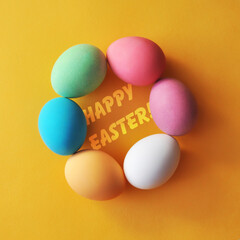 Preparation for the Easter holiday. Eggs and Easter decor on a bright background.