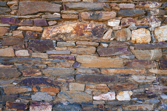 The stone wall. Grunge brick wall background. Background of old vintage brick wall. High quality photo              