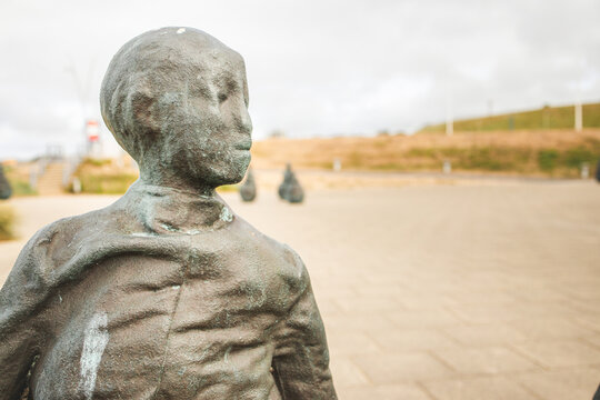 South Shields UK: 3rd June 2020 -Conversation Piece Aka The Weebles Weird And Wonderful Statues By Juan Munoz With Copy Space