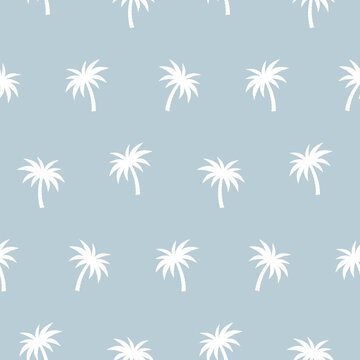 Palm trees seamless pattern. White palm trees on a blue background. Vector.