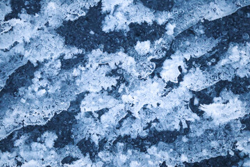 Ice texture natural blue surface with snow