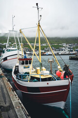 Fishing and sailing boats in the harbour of Klaksvik city in Bordoy island (Nordoyar) Faroe Islands, Denmark, Europe