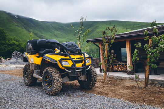 Sports ATV. Quadrocycle on a rocky road. Quad bike close-up. Riding on Quad bike services. Buying a sports ATV. Spare parts for quadrocycle. Rent a quadrocycle. Extreme hobby. Extreme travel.