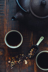 traditional black tea with a metal teapot