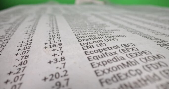 Macro shot of newspaper article in front of green screen