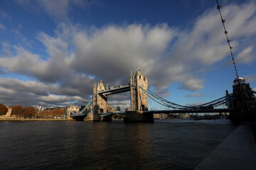 London view with the most iconic symbol of London, Tower Bridge illuminated by the last rays of the sun before sunset.
