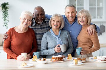 Group portrait of multiracial senior friends enjoying time together