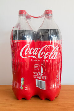 Pruszcz Gdanski, Poland - April 10, 2022: Four pack of 2 litre Coca-Cola bottles for 50 anniversary of Coca-Cola in Poland.