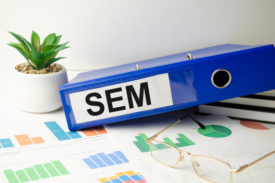 Word SEM 2022 Search Engine Marketing acronym concept . Business as usual concept image.