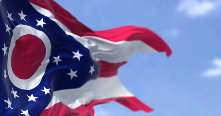 The US state flag of Ohio waving in the wind - obrazy, fototapety, plakaty