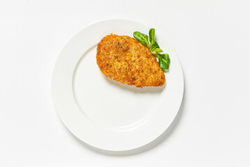 chicken cutlet on the white plate