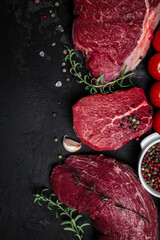 beef meat background, Assortment of raw steaks on a dark background, vertical image. top view. place for text