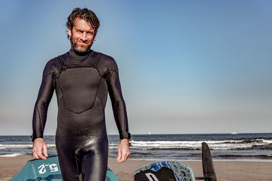wing foil old kiter on the beach