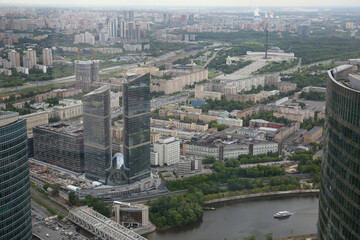 Obraz premium Aerial view of city Moscow in summer. Form from the observation platform of the business center of Federation Tower Moscow City. Photography from a height of 374 meters.