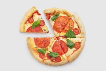 margherita pizza with basil on white background