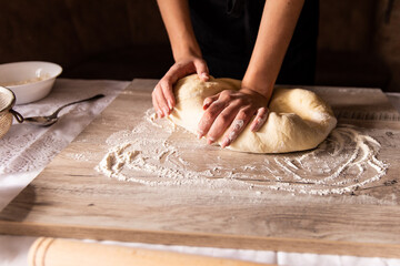Easter baking. The process of making cinnamon buns, cinnabons